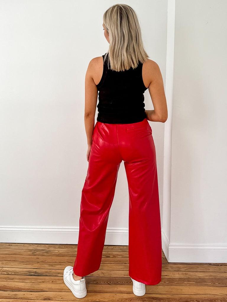 Crafted from high-quality vegan leather, these trousers offer a guilt-free fashion statemen