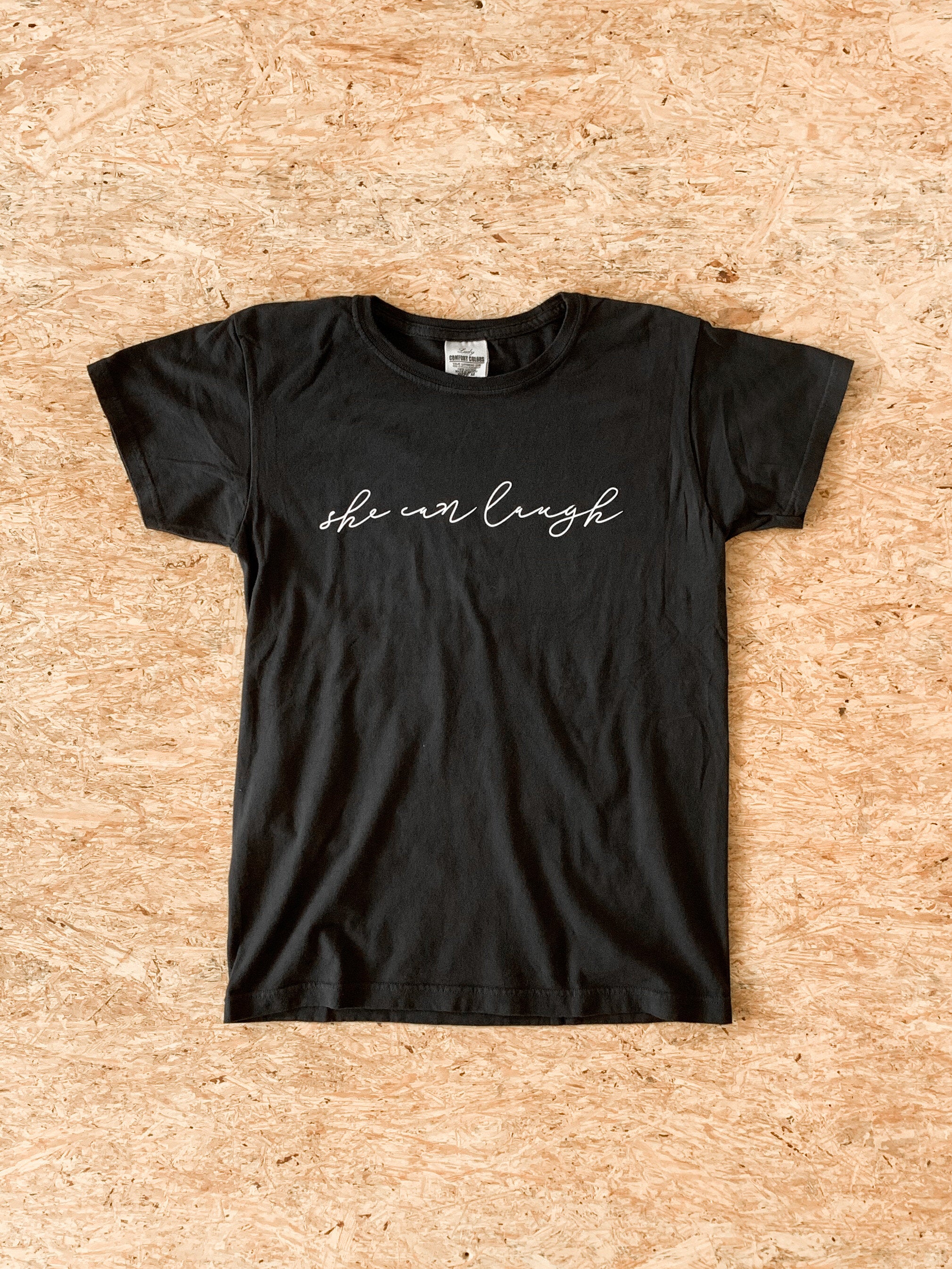 T-Shirt - She Can Laugh - Black - Women's Cut